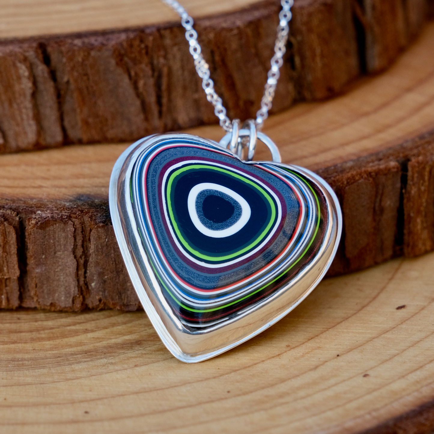 Fordite heart pendant