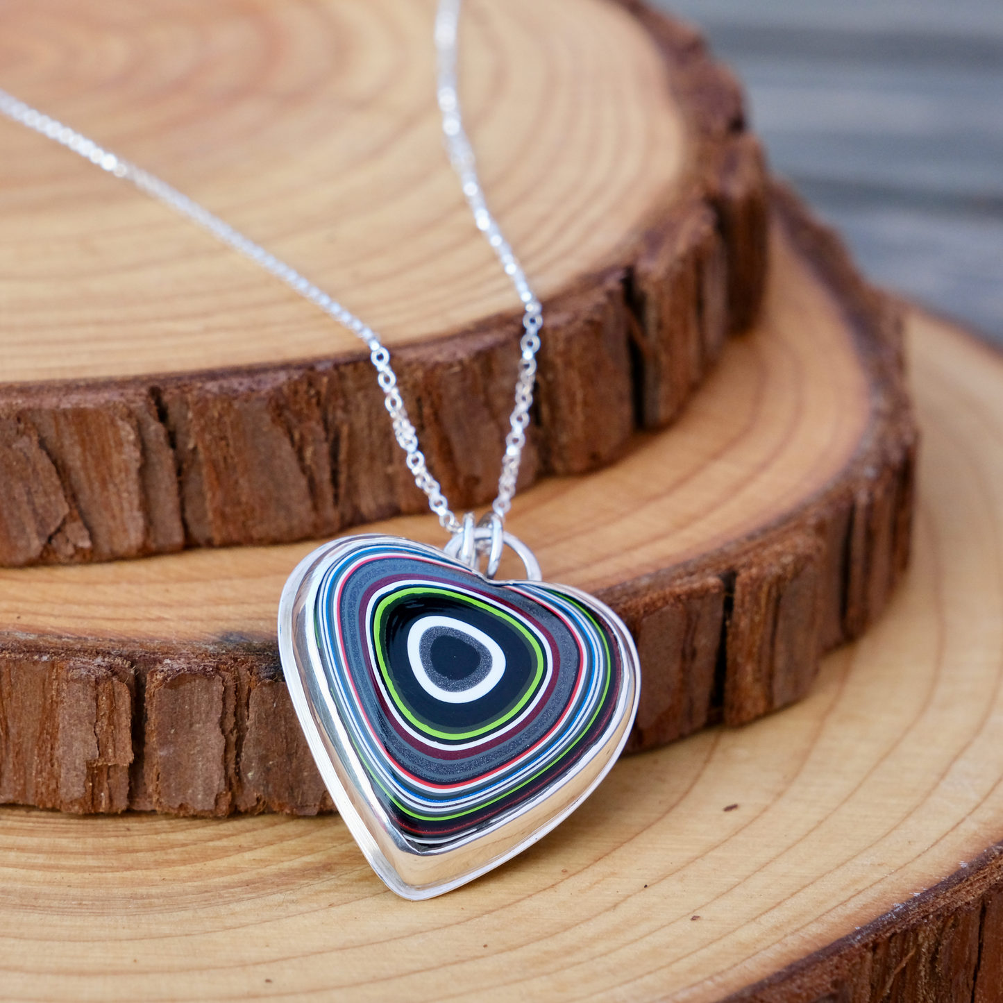 Fordite heart pendant
