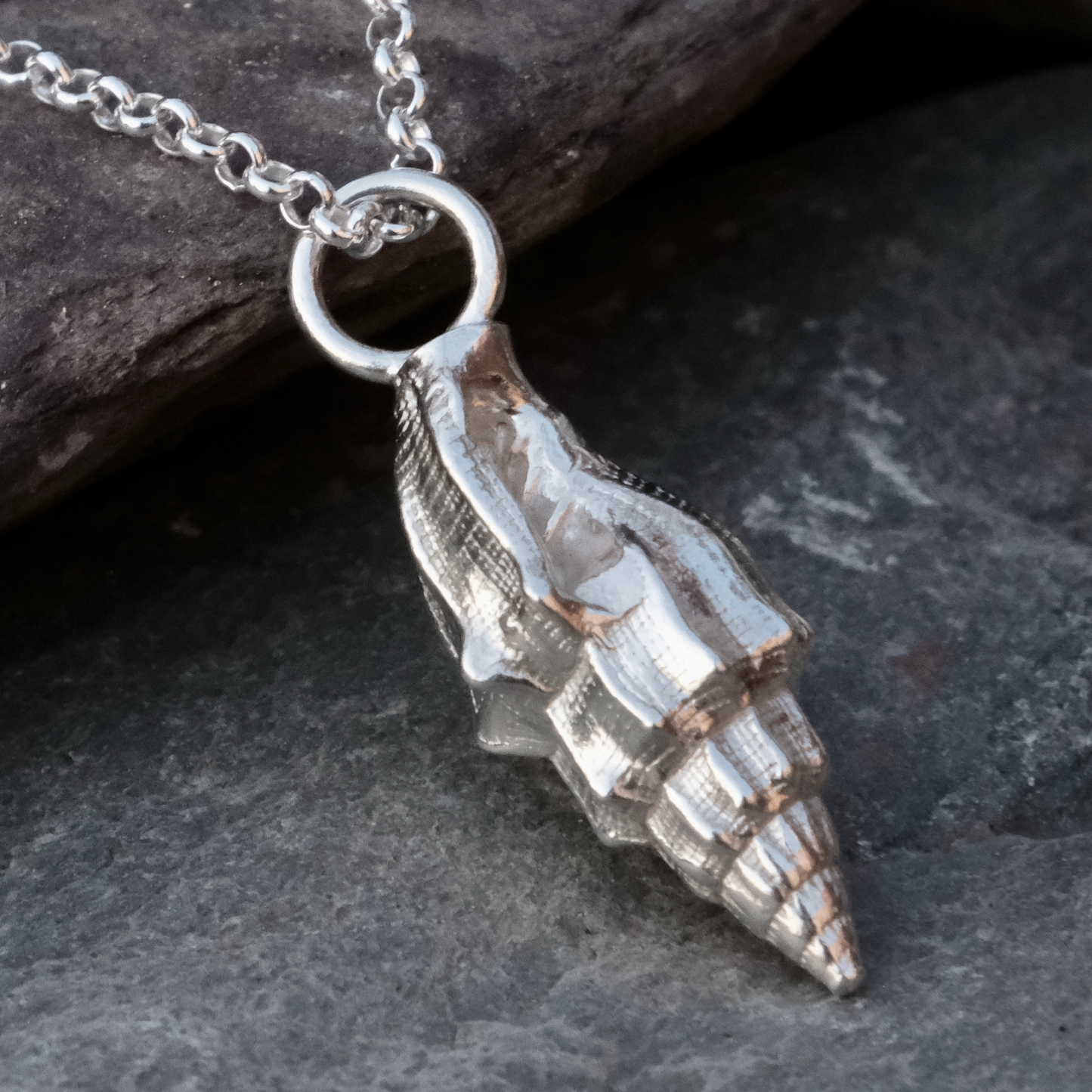 Small conch shell pendant