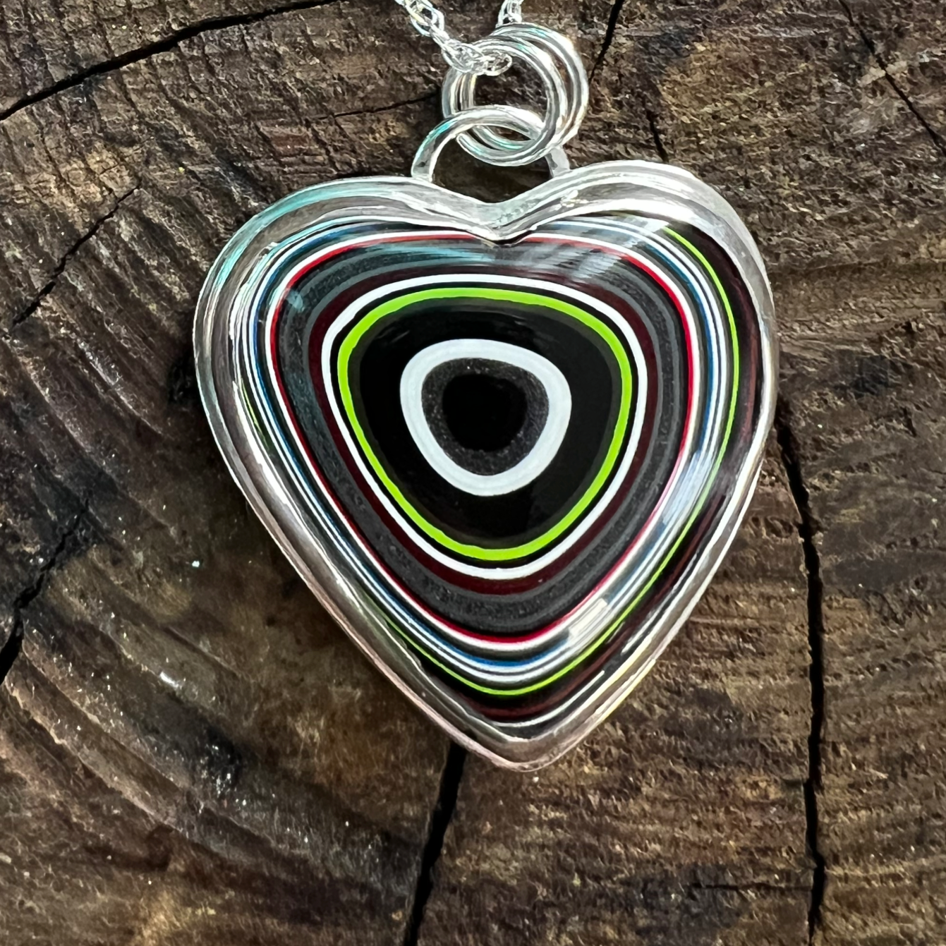 Fordite heart pendant